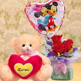 15cm Bear and 9 inches Heart Shape balloon with 3 Red Roses Standing Bouquet.