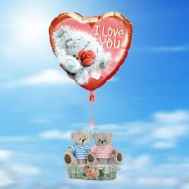 A Pair Of Love Bears in a basket with Helium Filled balloon
