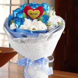 12 Blue Roses with heart shape Tag at centre