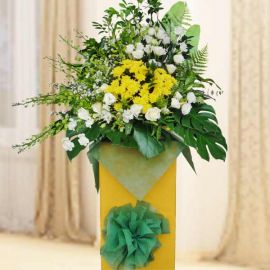 Green Orchids & Yellow Pom Condolence Flowers Delivery